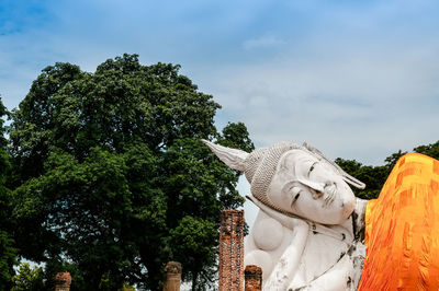 Low angle view of statue against sky