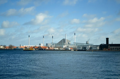 View of commercial dock against sky