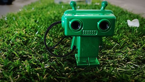 Close-up of toy on grassy field