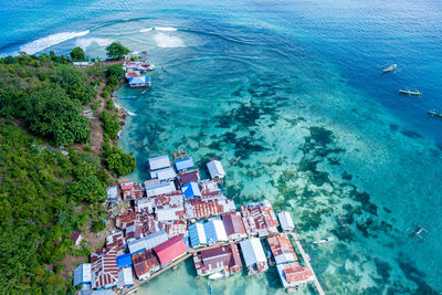 High angle view of sea and trees