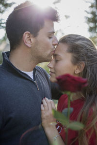 Young couple kissing outdoors