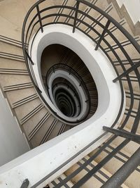 Directly below shot of spiral staircase in building