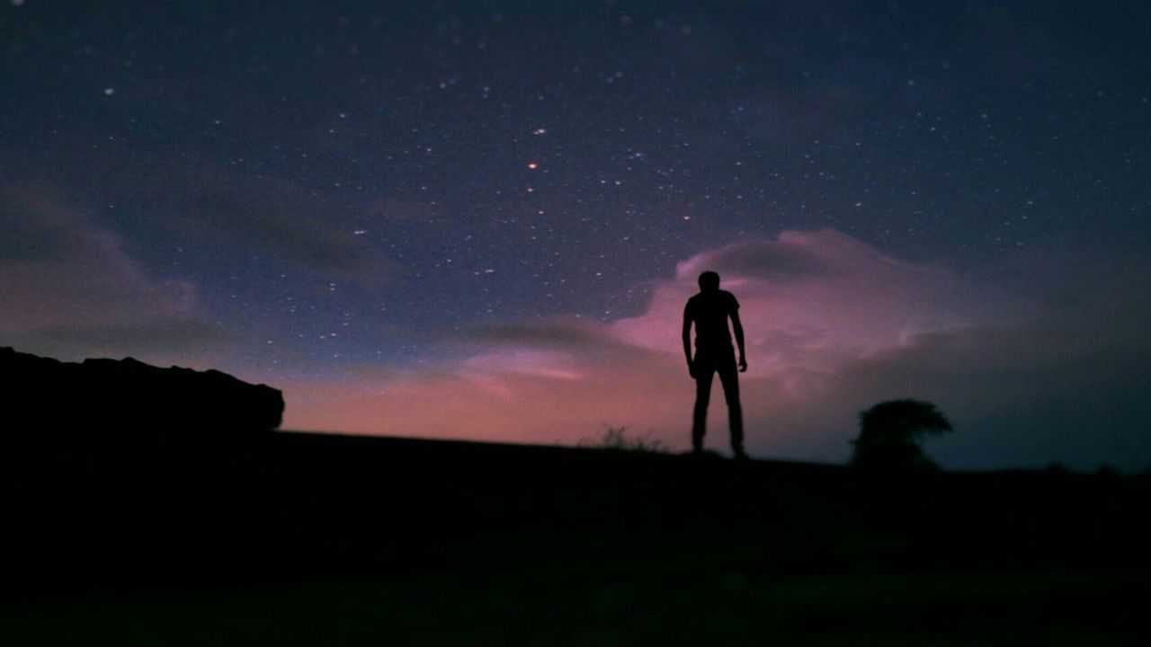 silhouette, sky, standing, lifestyles, men, leisure activity, scenics, tranquility, tranquil scene, rear view, beauty in nature, full length, nature, cloud - sky, night, dusk, dark, landscape