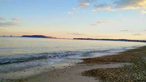 Scenic view of sea at sunset