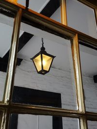 Low angle view of electric lamp