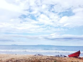 Scenic view of beach against sky