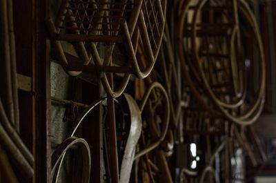 Old metal equipment hanging in workshop