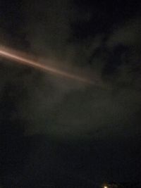 Low angle view of vapor trails in sky