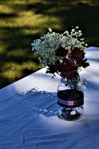 Close-up of rose flower vase on table