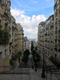 Buildings in city against sky
