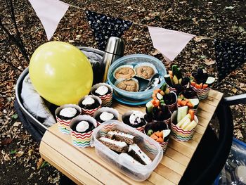 High angle view of sweet food on table outdoors