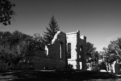 Low angle view of historic building against clear sky