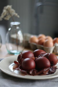 Close-up of fruits in plate on table