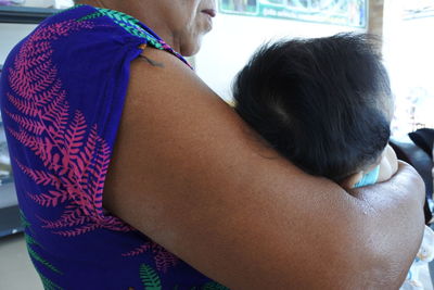 Rear view of couple kissing