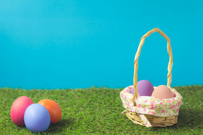 Colorful easter eggs in basket