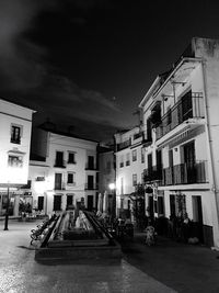 Buildings in city against sky