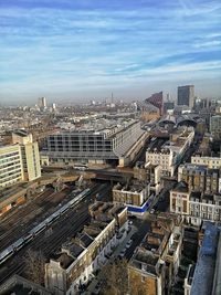 High angle view of buildings in city against sky