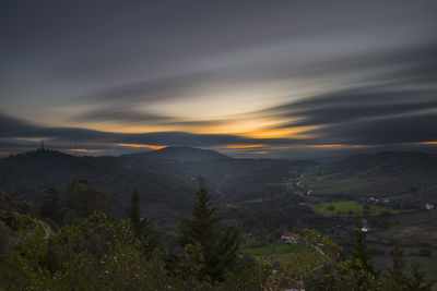 Scenic view of mountains against sky during sunset