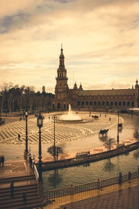 View of historic building against cloudy sky