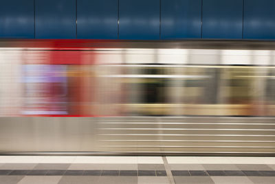 Blurred motion of train at subway station