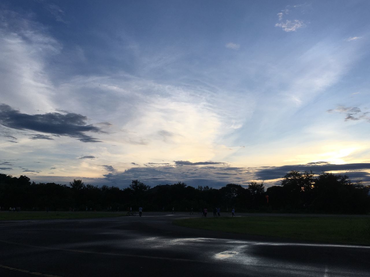 SCENIC VIEW OF FIELD AGAINST SKY DURING SUNSET