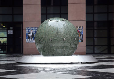 Close-up of sculpture on floor