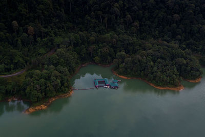 Aerial top view of water chalet resort in kenyir lake, terengganu, malaysia.