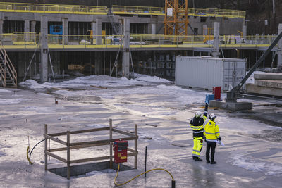 View of engineers at building site