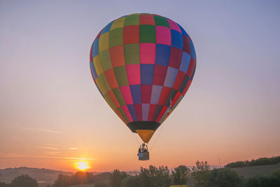 Beautiful hot air balloon flying at the sunrise