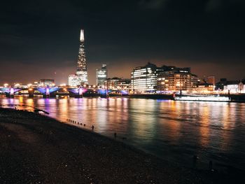 View of city lit up at night