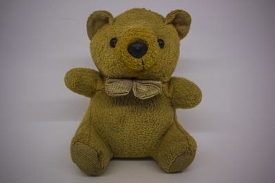 Close-up of stuffed toy against white background