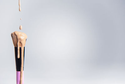 Close-up of drop against blue background