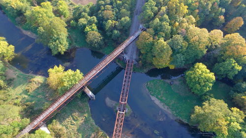 Panoramic view of bridge over trees against sky