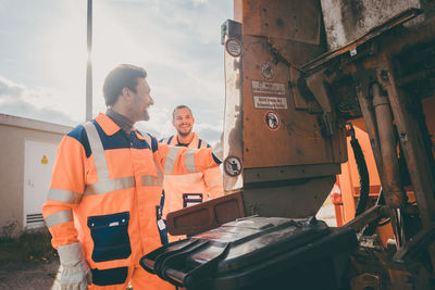 Men working at bus