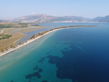 Scenic view of sea against blue sky