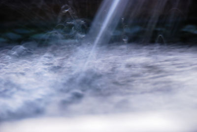 Close-up of waterfall against sky