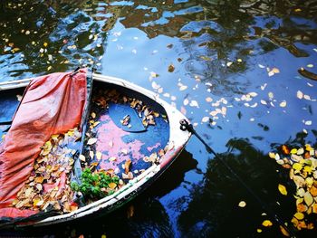 High angle view of boat floating on lake