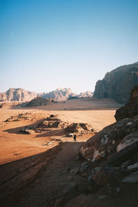 Scenic view of desert against clear sky