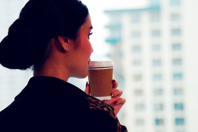 Portrait of man drinking coffee