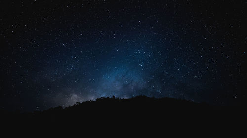 Meteor and milky way star in the night before sunrise