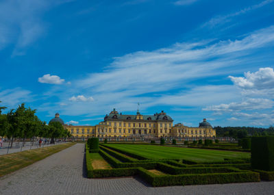 View of building against cloudy sky