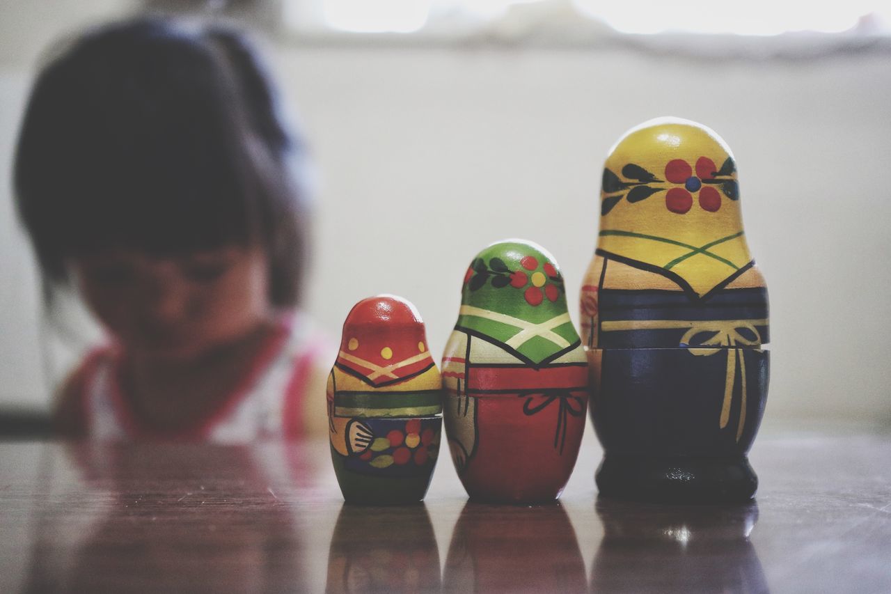 art and craft, focus on foreground, indoors, multi colored, childhood, table, easter, close-up, no people, day