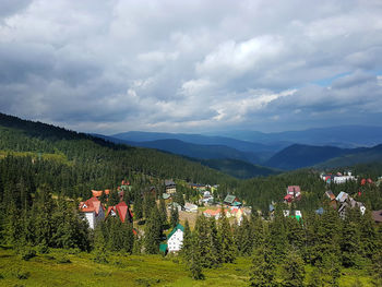 Scenic view of landscape and mountains against sky