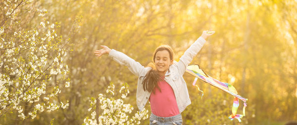 Cheerful girl enjoying at park