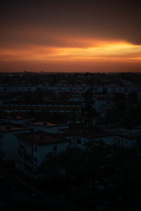 High angle view of townscape against sky during sunset