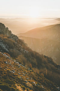 Scenic view of landscape against sky during sunset