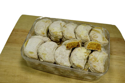 High angle view of bread on cutting board