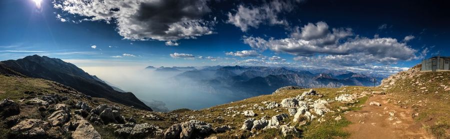 Panoramic view of mountains against sky during winter