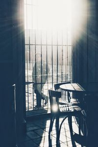 Chairs and table against window