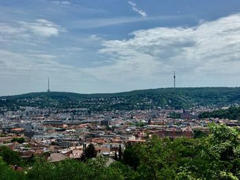 Aerial view of town against sky